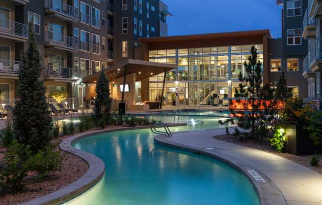 Veranda Highpointe Apartments Lazy River and Buildings at Night