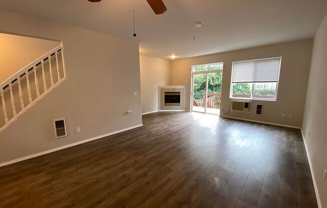 Fantastic Townhome with Gas Fireplace, Deck, Fenced Yard, and Vaulted Ceilings