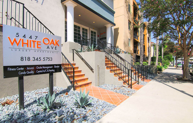 Entrance to Chateau Encino including drought tolerant landscaping.