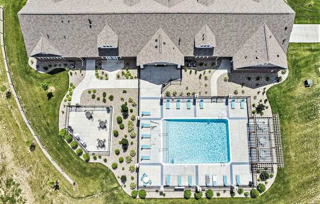 aerial view of outdoor pool and sundeck at Trade Winds Apartment Homes in Elkhorn, NE