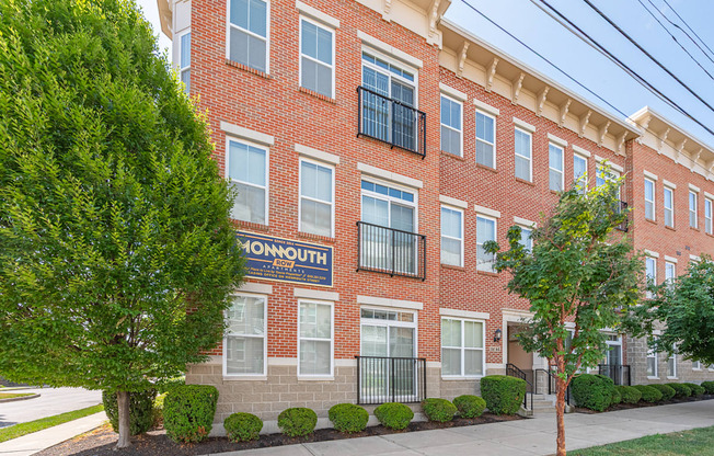 A red brick building with the word Monmouth on it.