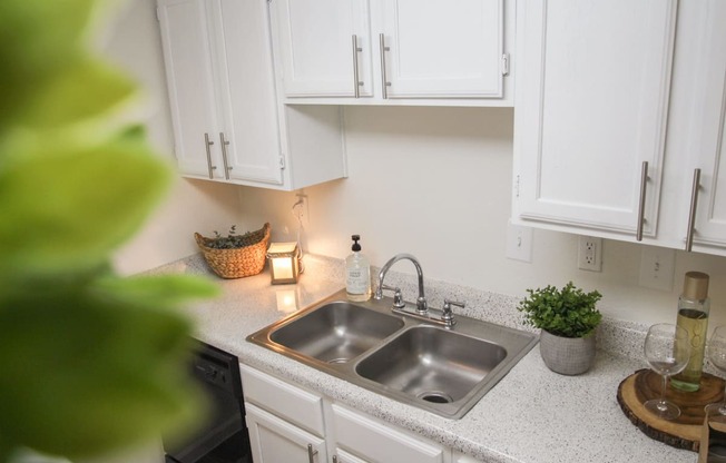 This is a photo of the kitchen in the 653 square foot 1 bedroom apartment at Princeton Court Apartments in Dallas, TX.