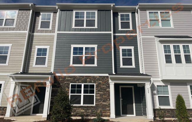 Brand New 4 Bedroom 3.5 Bath Townhome with 1st Floor Guest Suite 2 Car Rear Entry Garage and Internet Included in Carolina Springs Subdivision, Apex, Available Now!