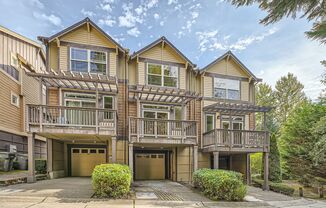 Charming three-level Townhome available for immediate move in.