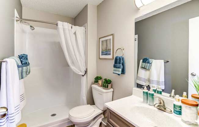 our apartments offer a bathroom with a bathtub  at ReNew at Neill Lake, Eden Prairie, MN