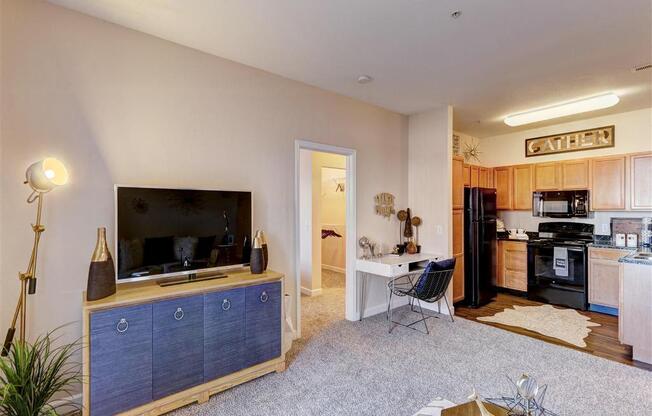 Residence at North Penn living room with office space and natural lighting