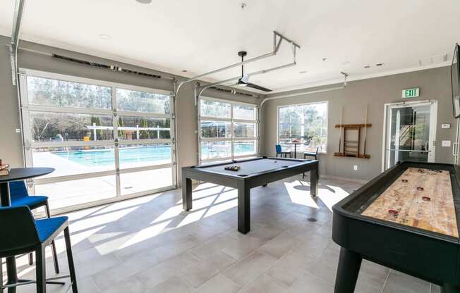 play a game of pool in our game room with a pool table