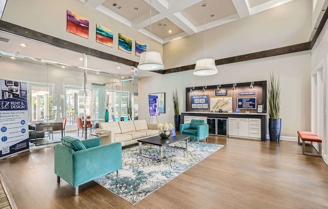 A spacious living room with a variety of furniture and a glass wall.