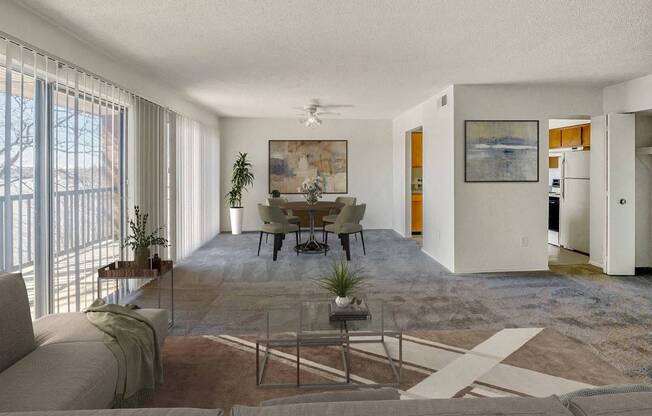 A living room with a couch, a coffee table, and a painting on the wall.