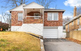 2 Bedroom SFH For Rent! NEW LVP Flooring, Fresh Paint, Private Backyard, and a Basement!