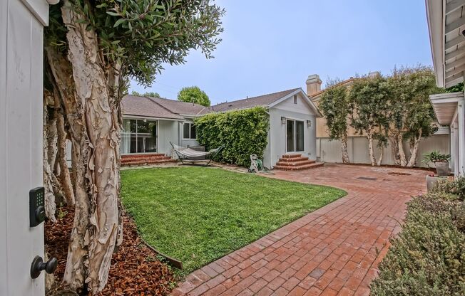 BEAUTIFULLY REMODELED (FURNISHED), 3BR3BA HOME W/ HUGE DETACHED BONUS ROOM, SPACIOUS FRONT & REARY FENCED YARDS ON A LARGE CORNER LOT JUST BLOCKS TO SCHOOLS, PARKS, DOWNTOWN & NORTH MB & 1 MINS TO BEACH!
