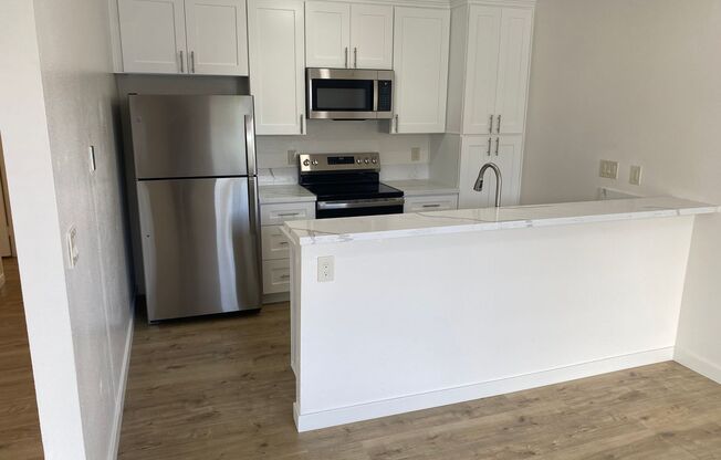 Move-In Special! Large 2BR Condo with GARAGE