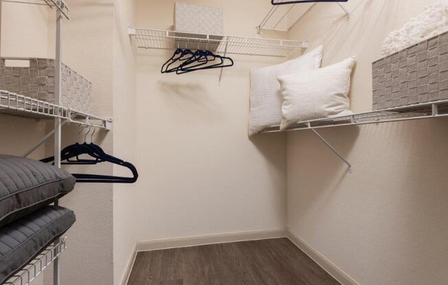 walk in closet with shelving features