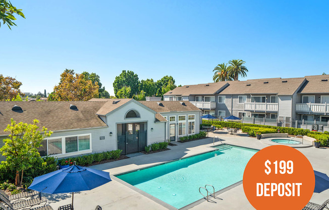 our apartments have a swimming pool and patio with umbrellas