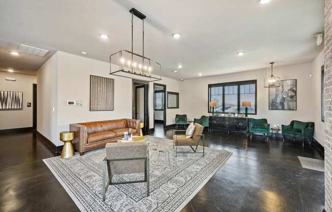 a living room with a leather couch and a coffee table