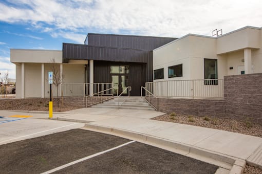 A modern building with a black and white exterior.