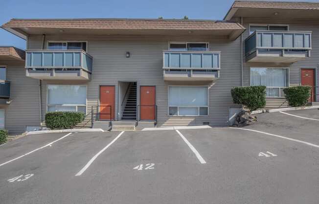 exterior building from the off street surface parking lot at Foster Creek apartments