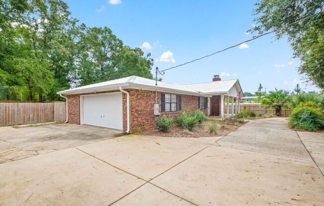 Gorgeous 4/2 Renovated Home in the Heart of Pace!!