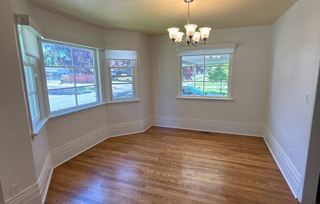 Model three bedroom home, with well-maintained yard & attached garage!