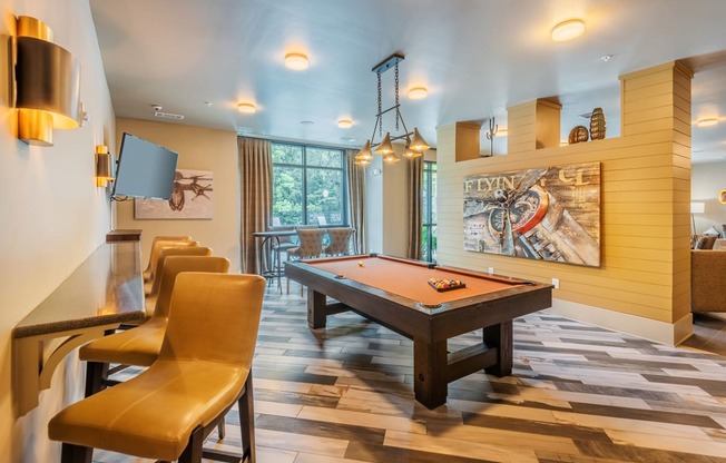 Centre Pointe Apartments game area with a billiards table