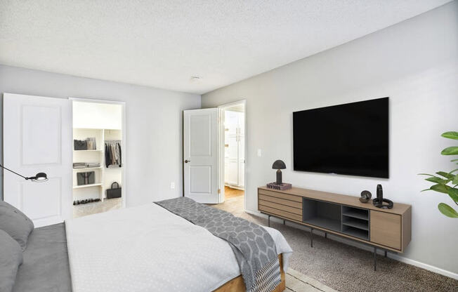 Model bedroom with walk-in closet