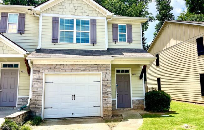 Welcome to this charming 2-bedroom, 2.5-bathroom home located in the vibrant community of East Point, GA.
