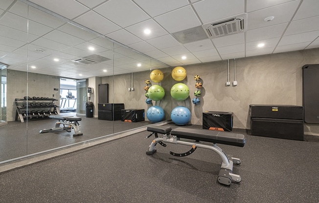 Gym with weight equipment l Rasa Apartments in Oakland CA