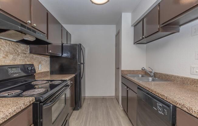 a modern kitchen with stainless steel appliances