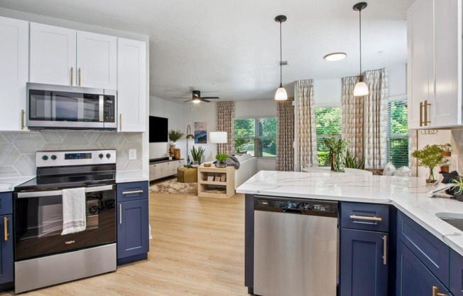 Modern kitchen with an open floor plan layout offered at Adara Godley Station, places for rent in Savannah, GA.