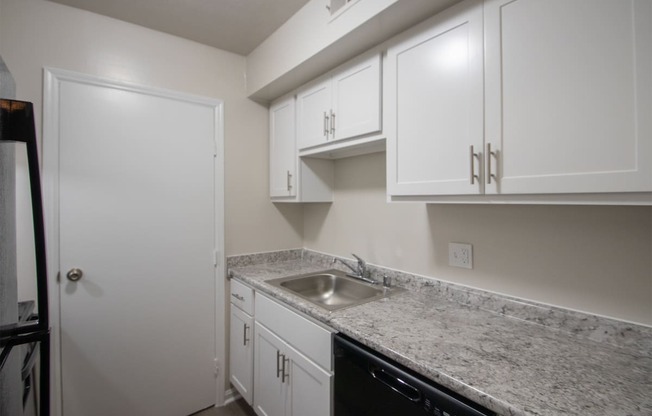 This is a photo the kitchen of an upgraded 1030 square foot, Oak 2 bedroom, 1 bath apartment at Montana Valley Apartments in the Westwood neighborhood of Cincinnati, OH.