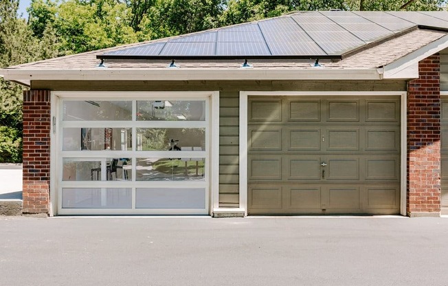 a garage door with a solar panel on top of it