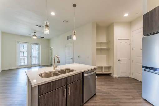 Well Equipped Eat-In Kitchen with sink at Residences at 3000 Bardin Road, Grand Prairie, 75052