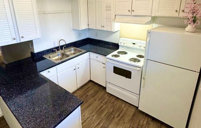 Spanish Stone Apartments