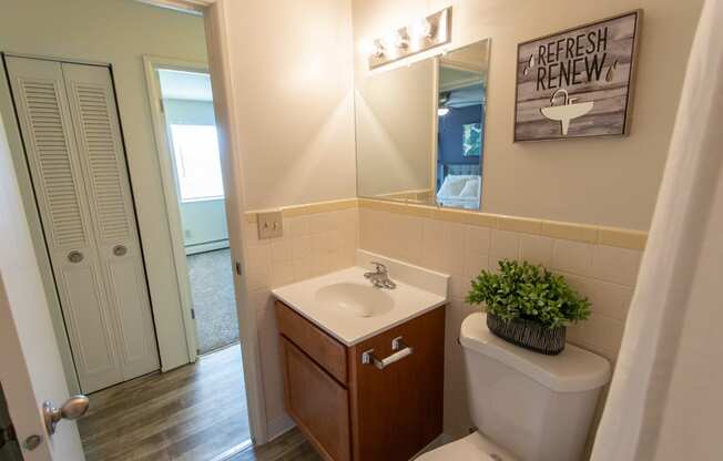 This is a photo of the bathroom in the 705 square foot 2 bedroom, 1 bath apartment at Lisa Ridge Apartments in the Westwood neighborhood of Cincinnati, Ohio.