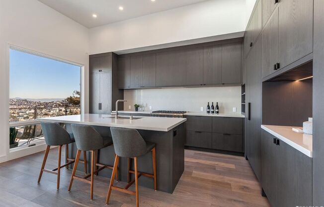 **PRE-MARKET OPPORTUNITY** Glen Park: Impressive Top Floor Unfurnished 2 Bed 2 Bath with Private Deck, Views, Garage Parking, & In-Unit Laundry