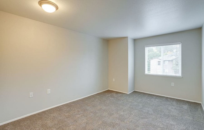 Room with carpet and window