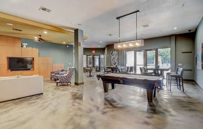 the preserve at ballantyne commons community clubhouse with a pool table