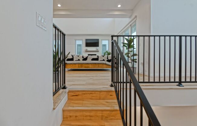 Custom, Modern & Spacious Tri-Level Home w/ Amazing Great Room Living Space, 4 Balconies/Decks, Ocean Views & 2-Car Garage Close to Schools, Restaurants, Shopping & Just 4 Blocks to Beach!