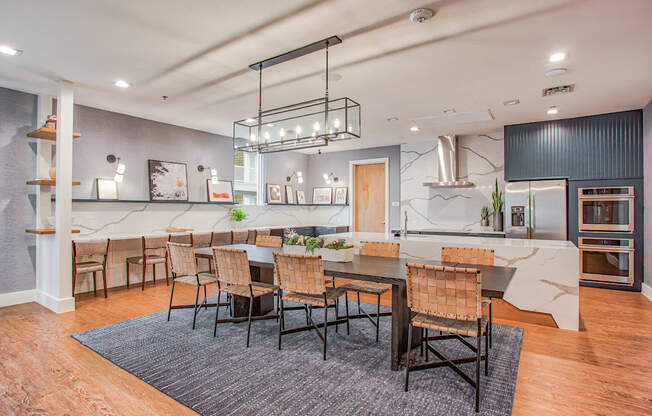 a large kitchen and dining room with a table and chairs at Presidium Revelstoke, Fort Worth, TX, 76131