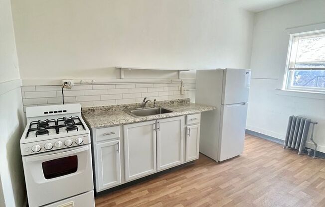 321-331 Driving Park Avenue (25 Broezel Street)