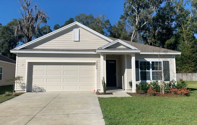 Beautiful Home Located In The New Chestnut Village Neighborhood On SW Archer Road