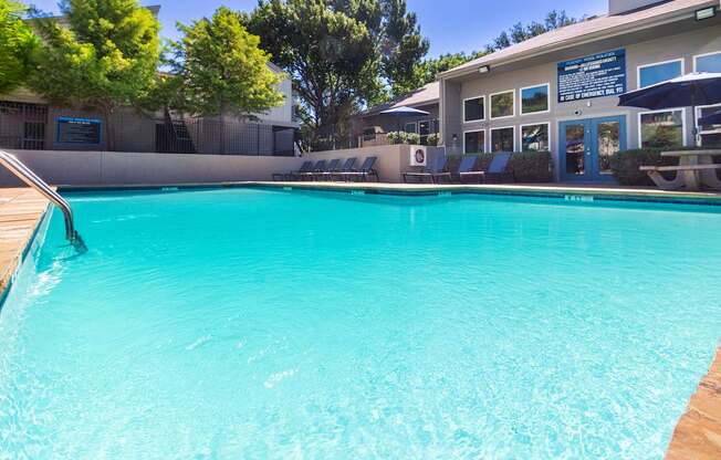 The pool area at The Biltmore Apartments located in the Vickery Midtown neighborhood of Dallas, TX.