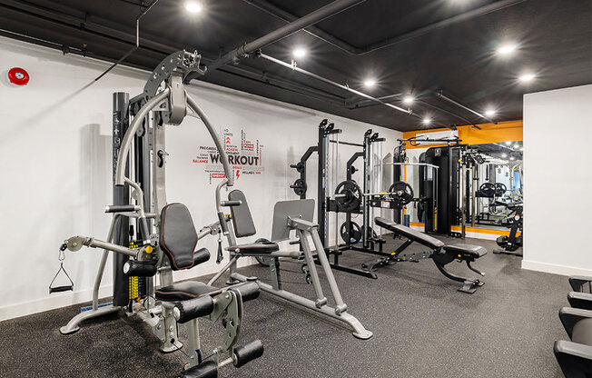 On-site fitness center with treadmills and weight machines.