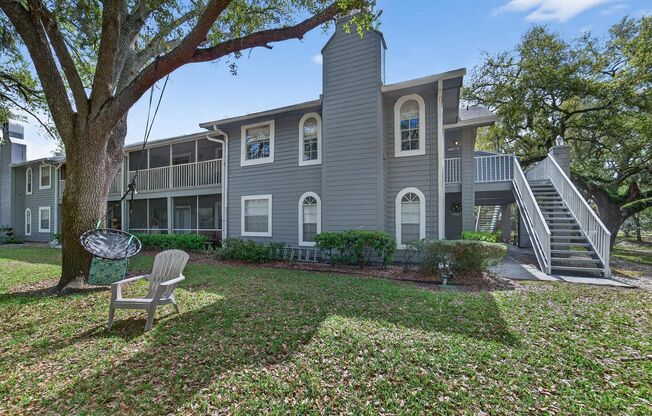 Lakeview corner condo in the desirable Raintree Village community! This 3-bedroom, 2-bath second-floor unit