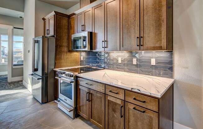 Indoor entertainment kitchen with marble countertops