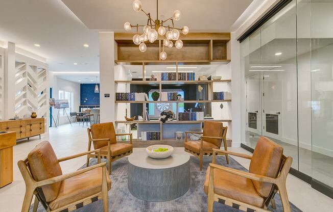 a living room filled with furniture and a table