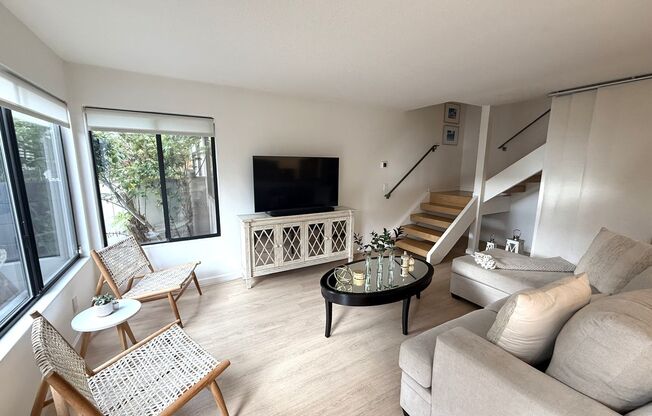 UPDATED TWO BEDROOM / ONE BATH TWO-STORY CONDO IN CAPTAINS COVE