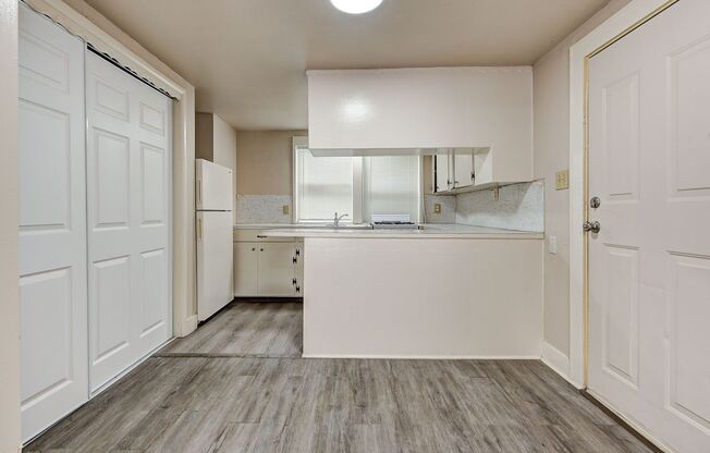 Charming Home Near Midtown: Wood Flooring and Prime City Access! Available now!