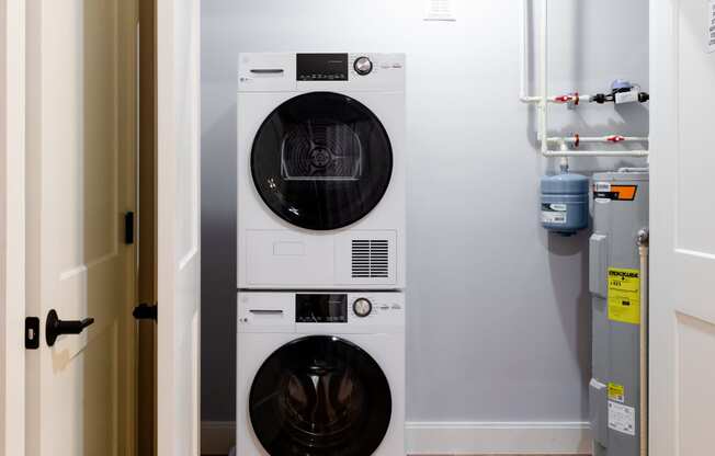 a washer and dryer in a small laundry room
