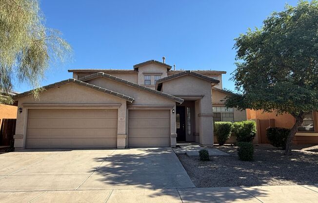 Spacious Home 4 bed, 3 bath home in Prestigious Gated Golf & Lake Community!
